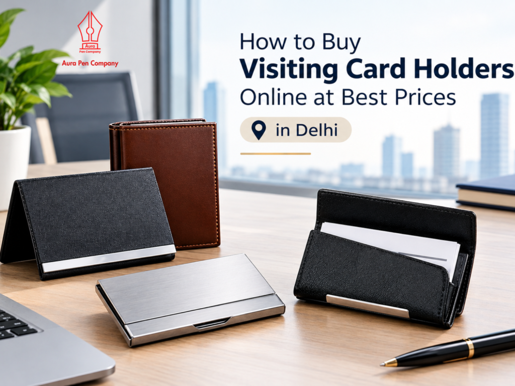 Current image: Black leather, brown leather and brushed steel visiting card holders on an office desk, Aura Pen Company Delhi